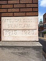 Czech cornerstone at the St. Wenceslaus Lyceum that reads "Katolická Budova Sv. Václava" (The Catholic Building of St. Wenceslaus).