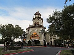 The entrance to Sunset Station, a hotel-casino with bowling alleys, movie theaters, and outdoor concert venues. It sits at the center of a large shopping district which includes the Galleria Mall, several bookstores, arts and craft supply stores, and general shopping and restaurants.