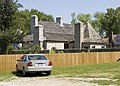 Rear view of house and detached kitchen