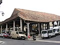 The 16th century covered wooden market on market day.