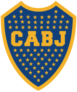 A Blue shield with a golden border. Inside the shield, 67 stars inside the shield with the golden letters "CABJ" (meaning "Club Atlético Boca Juniors") printed around the center, separating the stars