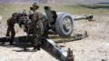 Afghan troops preparing to fire a D-30 122 mm Howitzer