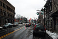 A Target retail store contrasted by small shops and eateries on Penn Circle.