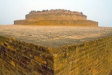 Corner of light-colored, angular stone ruins