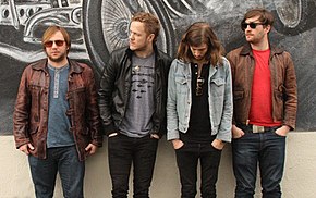 Imagine Dragons as they appeared in late 2012. From left to right, Ben McKee, Dan Reynolds, Wayne Sermon and Dan Platzman