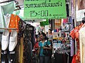 Atmosphere of clothing and textile stalls on Phahurat.