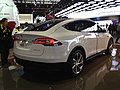 Back view of a Tesla Model X at the North American International Auto Show