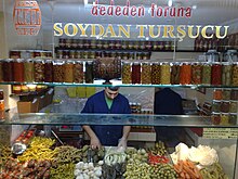 A large display of pickled vegetables