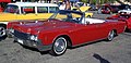 Lincoln Continental c. 1966, 4-door with integral automatically operating, self-storing tonneau