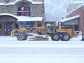 A grader plowing snow near Grand Junction, Colorado