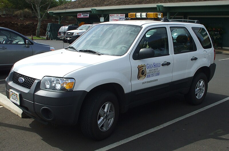 File:GoldShieldSecurityCar.jpg