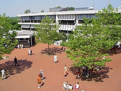 Students in a high school courtyard.