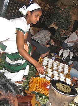 An Ethiopian woman preparing coffee