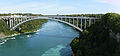 The Rainbow Bridge across the Niagara River, connecting Canada (left) to the United States (right). The parabolic arch is in compression, and carries the weight of the road.