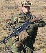 Member of the Squadron of Exploration of Cavalry 4 of the Argentine Army carrying a FN MAG machine gun