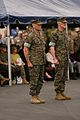 Two generals wearing woodland MARPAT at a ceremony