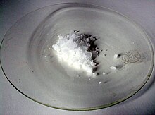 Solid sample of ammonium persulfate, as a white powder