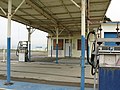 An abandoned gas station at Avenue N and 10th Avenue.