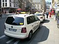 Volkswagen and Mercedes taxis at Cologne, Germany.