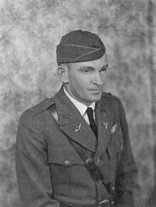 Air Service officer wearing garrison cap and uniform with Sam Browne belt.