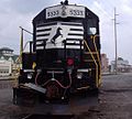 A NS GP38-2 in Dover, Delaware, with depot in background