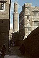 Houses in old Sana'a. Ibex and Bull were sacred animals in ancient Yemen. Yemenis put Ibex or Bull horns at top of houses to protect from evil eyes.[73]