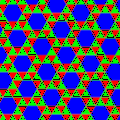 one of the 8 semi-regular tessellations (ignoring the colors: p6); the translation vectors are rotated a little to the right compared with the directions in the underlying hexagonal lattice of the image