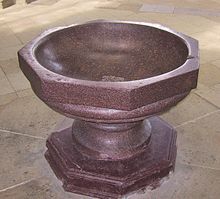 Baptismal font in the Cathedral of Magdeburg, Germany. The font is made of purple porphyry quarried from Gabal Abu Dukhan.