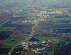 Blumenort (located in the lower portion) as seen from the air with Steinbach (upper) seen to the southern part of the picture.