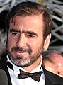 Eric Cantona made 185 appearances and scored 87 goals for Manchester United. He was the club's first captain from outside the British Isles.