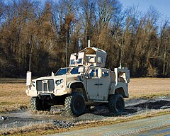 Oshkosh L-ATV in M1278 Heavy Guns Carrier JLTV configuration and with Objective Gunner Protection Kit (OGPK)