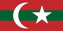 Flag featuring a crescent and a white star on a background of three horizontal stripes, two red stripes framing a green stripe.