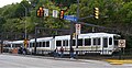 A two-car light rail train entering the Mount Washington transit tunnel.