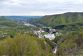 View of Bistrița village, with Bistrița Monastery in the foreground