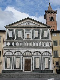 The Collegiate Church, Empoli, Italy, represents a screen facade. The polychrome marble decoration divides the facade into zones while giving little indication of the architectural form behind it.