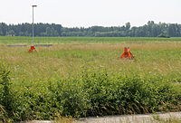 Remnants of tower foundations, in July 2015