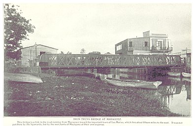 Iron truss bridge over the Yagüez River