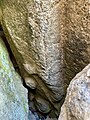 upside down Buddhist statue in the walls