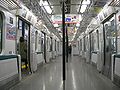 Inside a former E231-500 series 6-door Tokyo Yamanote Line car with the seats folded up