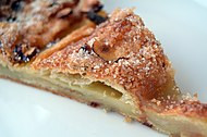 A slice of a kringle with remonce, a type of Danish pastry common in Denmark