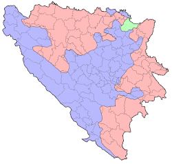 The Republika Srpska (red) within Bosnia and Herzegovina. The Brčko District (green) belongs to both entities.3