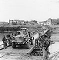 An Otter Light Reconnaissance Car crossing a Bailey bridge over the Volturno river at Grazzanise, 14–16 October 1943.