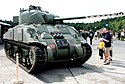 Sherman Firefly tank showing half of gun barrel disrupted by paintwork