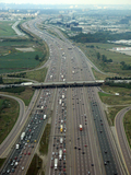 Highway 401 uses a collector-express roadway configuration to manage high traffic volumes. Highway 401's widest segment has 18 through lanes