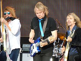 Styx performing in Omaha, Nebraska at Bank of the West Celebrates America in Memorial Park (Omaha) on July 2, 2010 (from left to right: Ricky Phillips, James Young, Tommy Shaw)