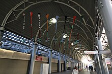 Suspended multipart sculpture by John Scott for Ruggles, Boston MA for the MBTA