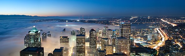 Fog rolls into Seattle from the sea