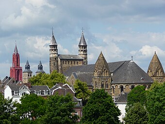 Maastricht, Netherlands, showing the Basilica of Our Lady, Maastricht to the right, and the shorter towers of the Basilica of Saint Servatius (with the tower of St Jan's Church to the left)