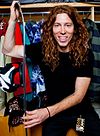 Shaun White holding a metal bar in 2011