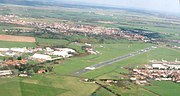 Aerial photo of runway at Southend Airport, looking north-east, showing the church in the lower left, taken in 2007